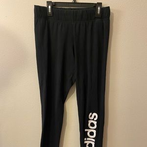 Brand: Adidas. Size:L. Color: Black and white.